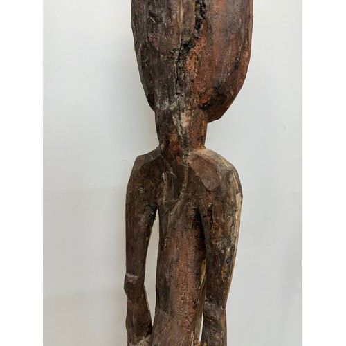 4 - Tribal art, hand carved and painted a large figure from New Guinea, 96 cm tall.

This lot is availab... 