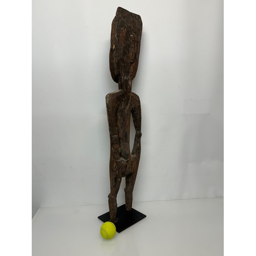 4 - Tribal art, hand carved and painted a large figure from New Guinea, 96 cm tall.

This lot is availab... 