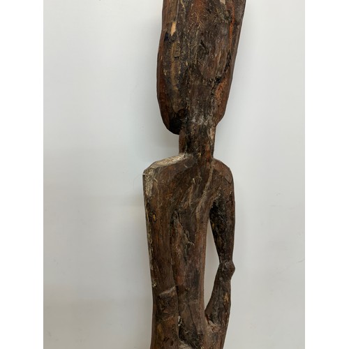 4 - Tribal art, hand carved and painted a large figure from New Guinea, 96 cm tall.

This lot is availab... 