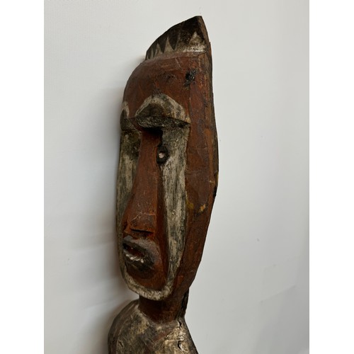 4 - Tribal art, hand carved and painted a large figure from New Guinea, 96 cm tall.

This lot is availab... 