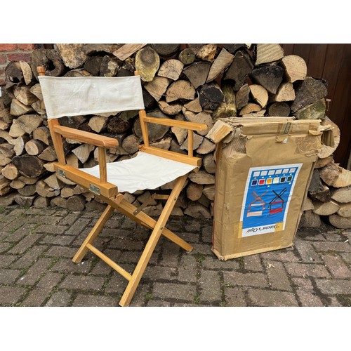 299 - Furniture, wooden framed folding directors style chair. This is one of a group of New Old Stock boxe... 