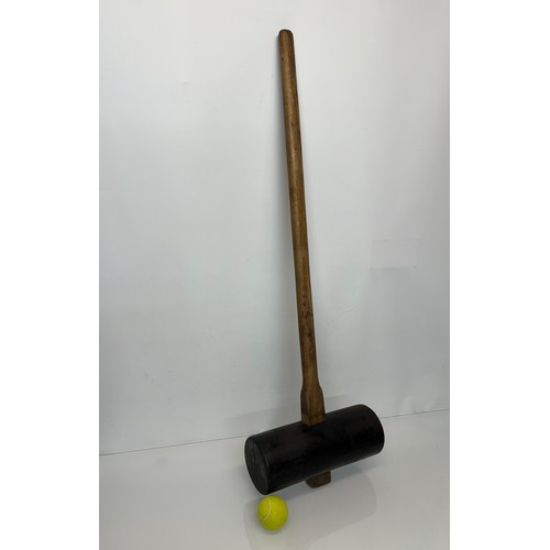 213 - Tools, a large rubber mallet for laying paving slabs.

This lot is available for in-house shipping