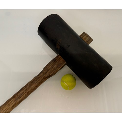 213 - Tools, a large rubber mallet for laying paving slabs.

This lot is available for in-house shipping