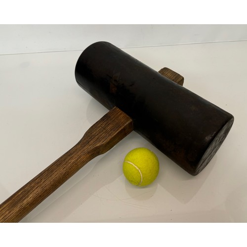 213 - Tools, a large rubber mallet for laying paving slabs.

This lot is available for in-house shipping