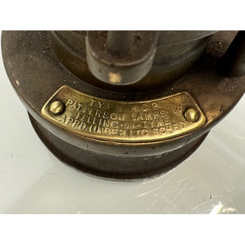 215 - Tools, a miners HCP lamp, marked for Patterson Lamps of Felling on Tyne.29 cm. high.

This lot is av... 