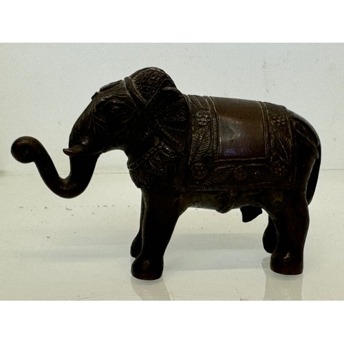 218 - Cast bronze figure of an Indian bull elephant, 13 cm long.

This lot is available for in-house shipp... 