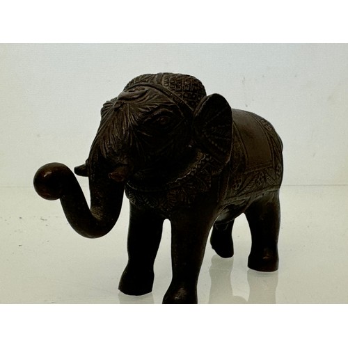 218 - Cast bronze figure of an Indian bull elephant, 13 cm long.

This lot is available for in-house shipp... 