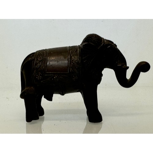 218 - Cast bronze figure of an Indian bull elephant, 13 cm long.

This lot is available for in-house shipp... 