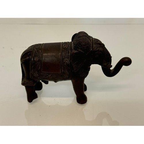 218 - Cast bronze figure of an Indian bull elephant, 13 cm long.

This lot is available for in-house shipp... 