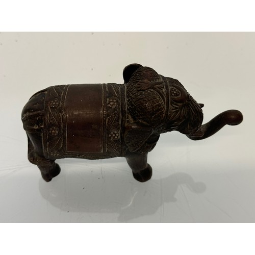 218 - Cast bronze figure of an Indian bull elephant, 13 cm long.

This lot is available for in-house shipp... 