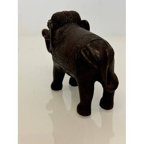 218 - Cast bronze figure of an Indian bull elephant, 13 cm long.

This lot is available for in-house shipp... 