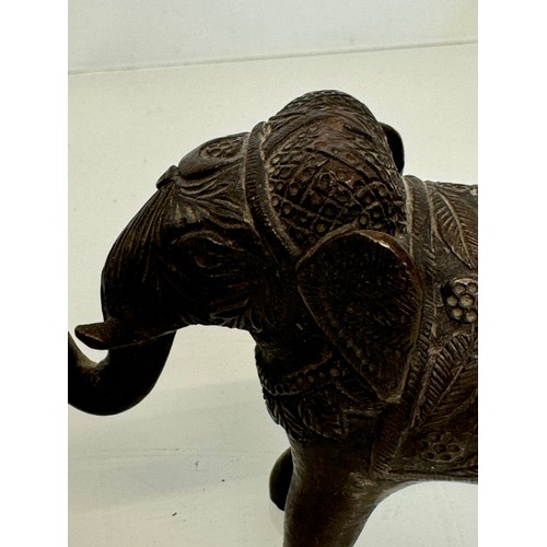 218 - Cast bronze figure of an Indian bull elephant, 13 cm long.

This lot is available for in-house shipp... 