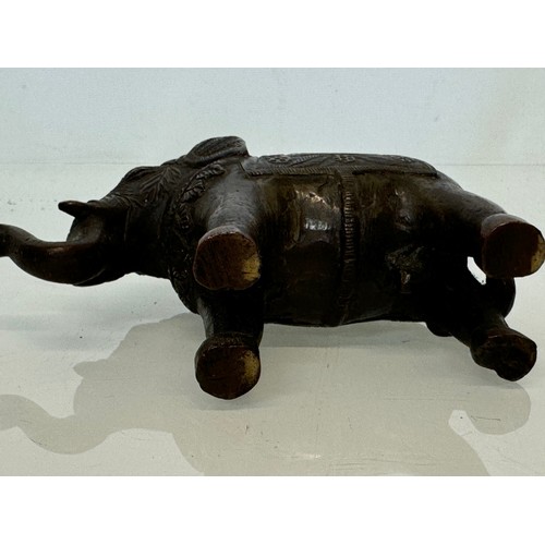 218 - Cast bronze figure of an Indian bull elephant, 13 cm long.

This lot is available for in-house shipp... 