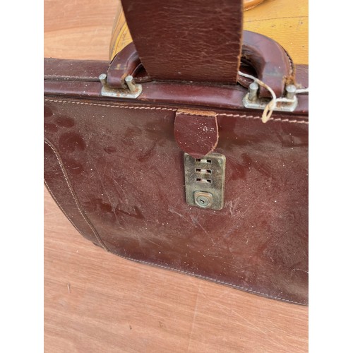 222 - Luggage, a BT works tool bag from the 1980’s and a briefcase.

This lot is available for in house sh... 