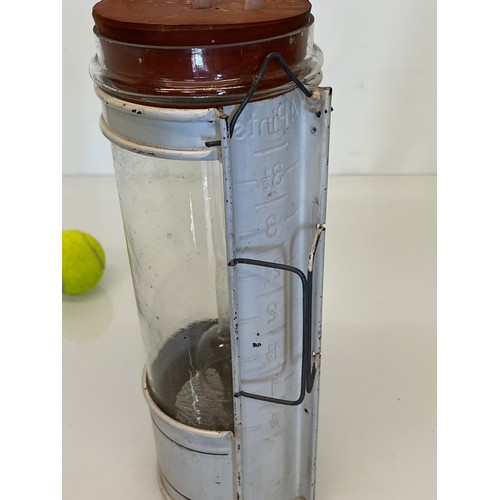 348 - Industrial, scientific glass, a measuring flask in a painted steel support.

This lot is available f... 