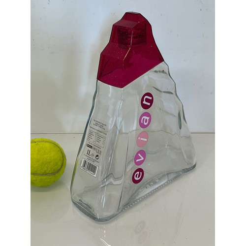 349 - Vintage Evian collectable water bottle, in the shape of a mountain.

This lot is available for in-ho... 