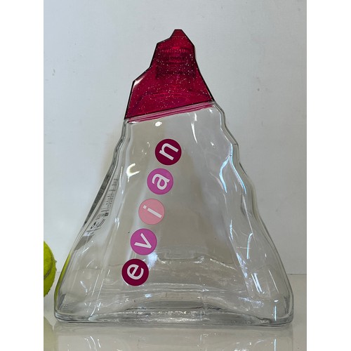 349 - Vintage Evian collectable water bottle, in the shape of a mountain.

This lot is available for in-ho... 