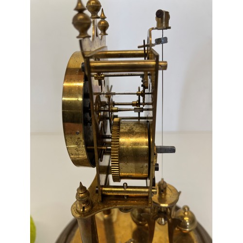 353 - Brass mantle clock in a domed glass cover.

This lot is available for in-house shipping