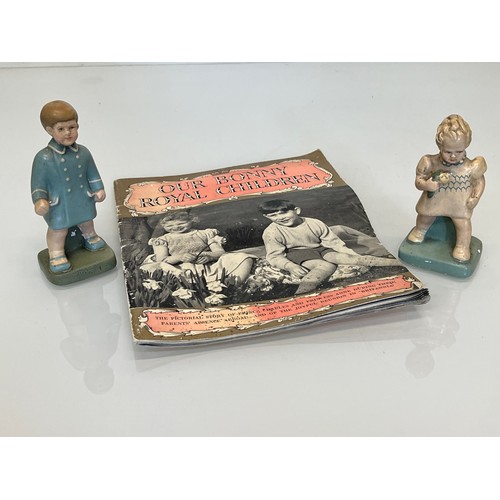 358 - Pair of figurines of Prince  Charles and Princess Anne a book on the Royal Children.

This lot is av... 