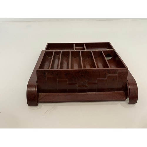 361 - Mid C20th Century Bakelite coin tray, 28 cm x 25 cm.

This lot is available for in-house shipping