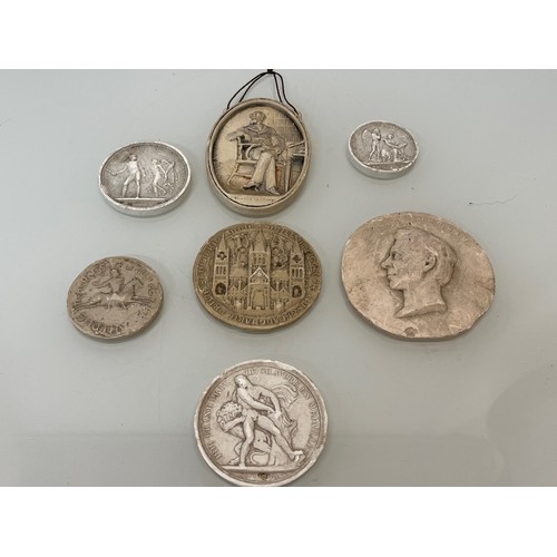 368 - A collection of plaster plaques and medallions, Charles Dickens etc.

This lot is available for in-h... 