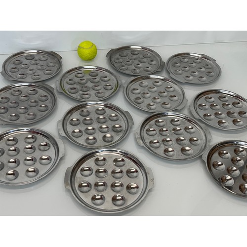 374 - Twelve stainless steel serving plates.

This lot is available for in-house shipping