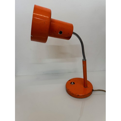 45 - Designer mid-century furniture and lighting, classic orange table lamp.


This lot is available for ... 