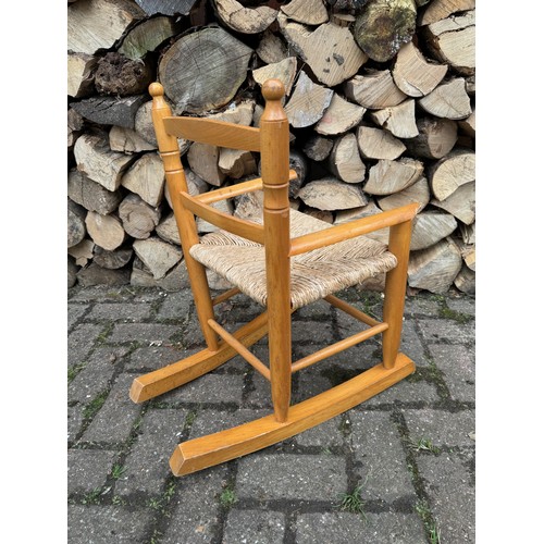 250 - Childs rocking chair.

This lot is available for in-house shipping