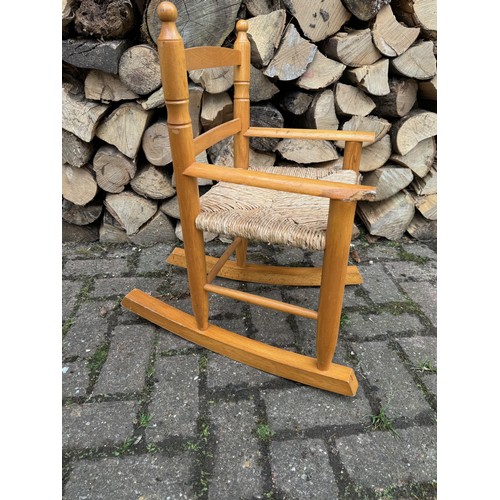 250 - Childs rocking chair.

This lot is available for in-house shipping