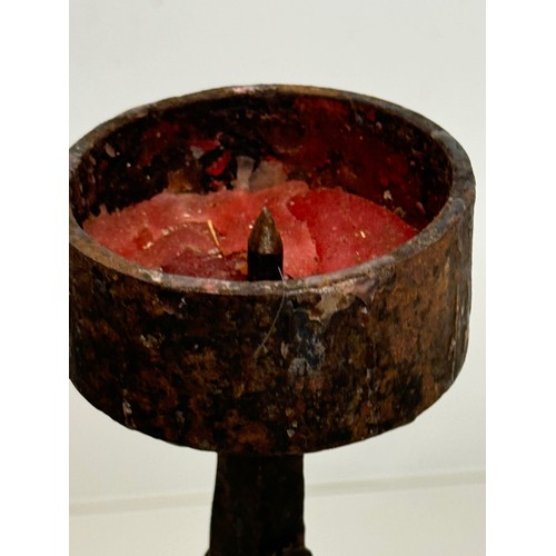 259 - Wrought iron art and crafts blacksmith made candle stand, 37 cm high.

This lot is available for in-... 