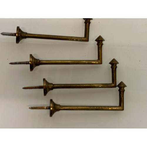 263 - Decorative fittings, Four brass art deco design tie backs, 11 cm long when mounted.

This lot is ava... 