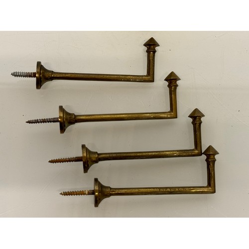 263 - Decorative fittings, Four brass art deco design tie backs, 11 cm long when mounted.

This lot is ava... 