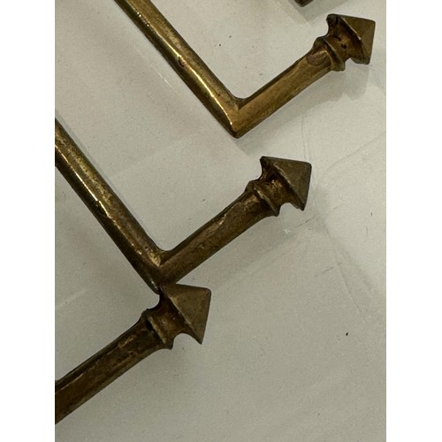 263 - Decorative fittings, Four brass art deco design tie backs, 11 cm long when mounted.

This lot is ava... 