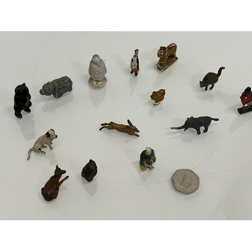 273 - A collection of animals figures and toys. Dogs, Pigs, Elephants, tigers etc.

This lot is available ... 