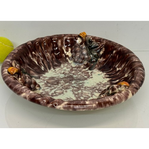 274 - Kitcsh mid century German studio pottery bowl decorated with grapes, 31 cm diameter.

This lot is av... 