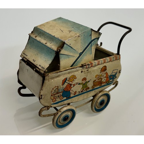 288 - Toys, lithographed tin plate German pram..

This lot is available for in-house shipping