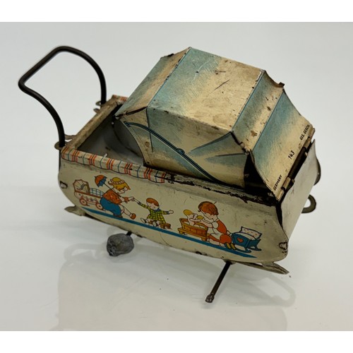 288 - Toys, lithographed tin plate German pram..

This lot is available for in-house shipping