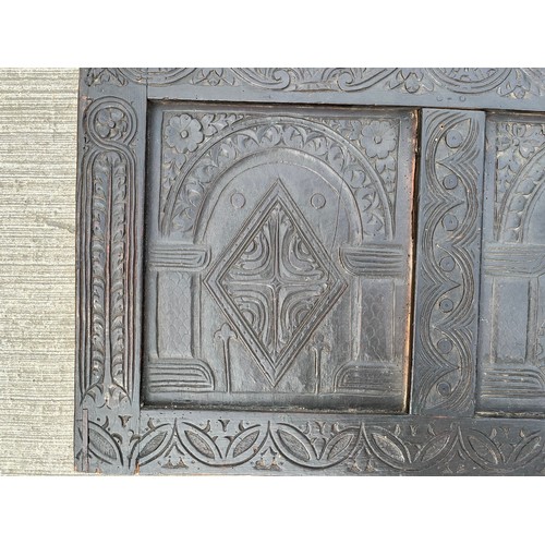 181 - Three section carved oak furniture panel. 147 cm x 62 cm.

This lot is collection only.