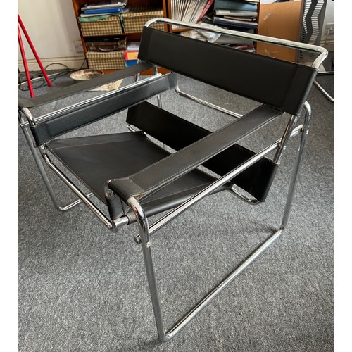 41 - Furniture, mid century modern, a pair of Wassily style chairs after Marcel Breuer.

This lot is coll... 