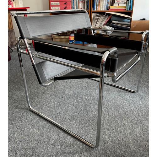 41 - Furniture, mid century modern, a pair of Wassily style chairs after Marcel Breuer.

This lot is coll... 