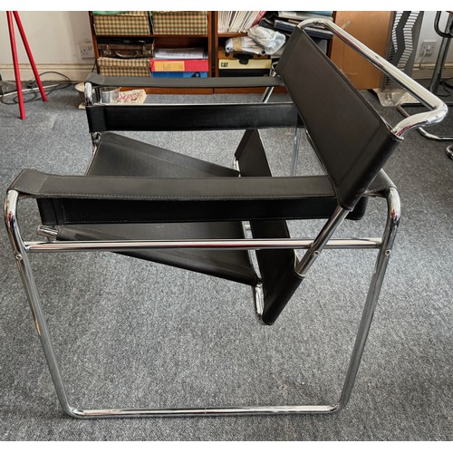 41 - Furniture, mid century modern, a pair of Wassily style chairs after Marcel Breuer.

This lot is coll... 