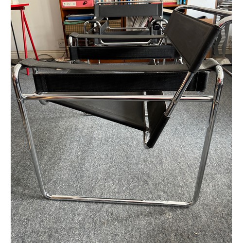 41 - Furniture, mid century modern, a pair of Wassily style chairs after Marcel Breuer.

This lot is coll... 