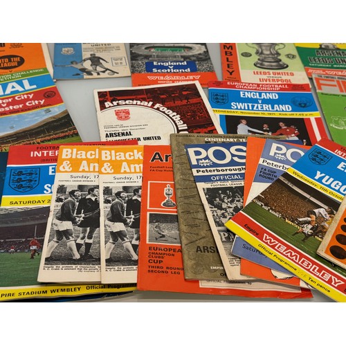 35 - Football programmes 1960’s - 70’s Man United, Liverpool, England Spurs etc. 22 in all.

This lot is ... 