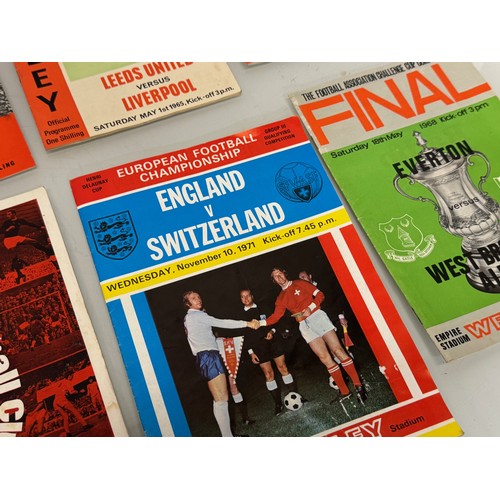 35 - Football programmes 1960’s - 70’s Man United, Liverpool, England Spurs etc. 22 in all.

This lot is ... 