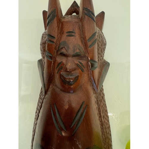 37 - Hand carved tribal art, wall hanging face mask 61 cm tall.

This lot is available for in-house shipp... 