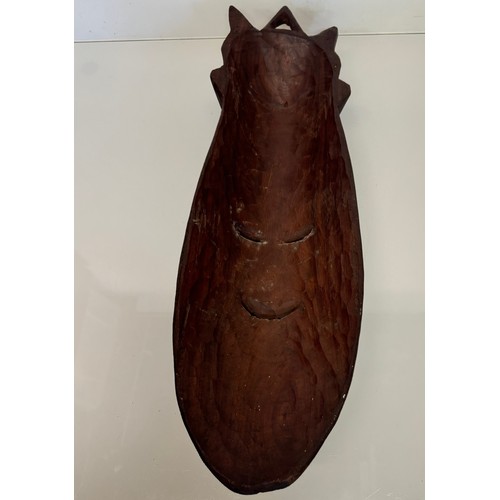 37 - Hand carved tribal art, wall hanging face mask 61 cm tall.

This lot is available for in-house shipp... 