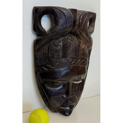 38 - Hand carved African tribal art wall mask 38 cm high.

This lot is available for in-house shipping