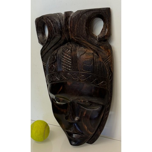 38 - Hand carved African tribal art wall mask 38 cm high.

This lot is available for in-house shipping