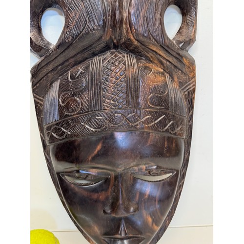 38 - Hand carved African tribal art wall mask 38 cm high.

This lot is available for in-house shipping