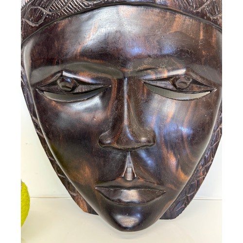 38 - Hand carved African tribal art wall mask 38 cm high.

This lot is available for in-house shipping